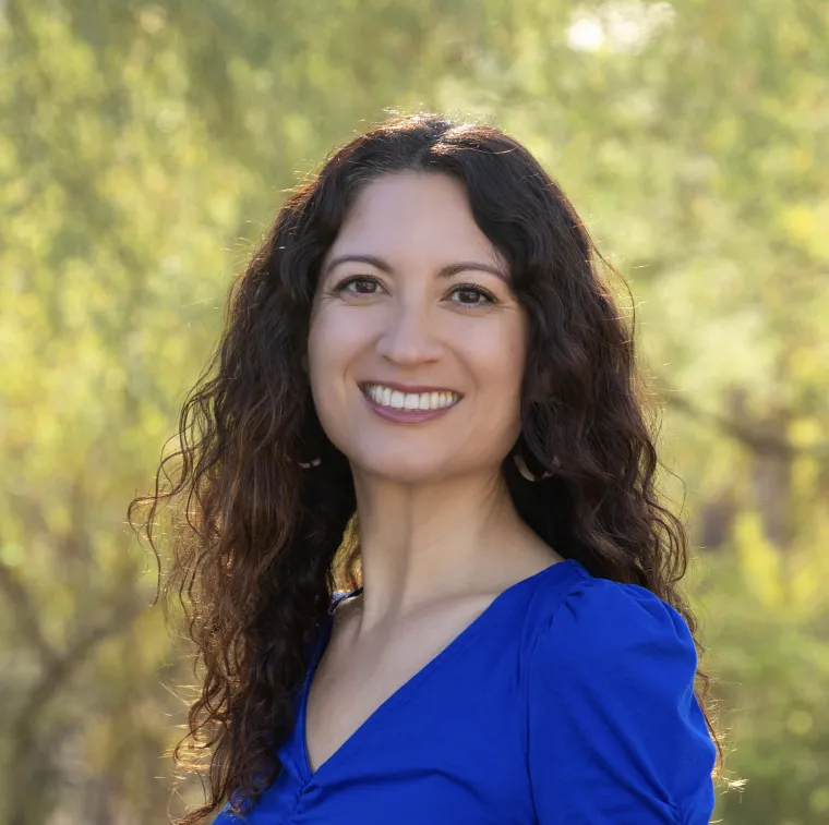 Headshot of Celina Ramirez wearing blue shirt